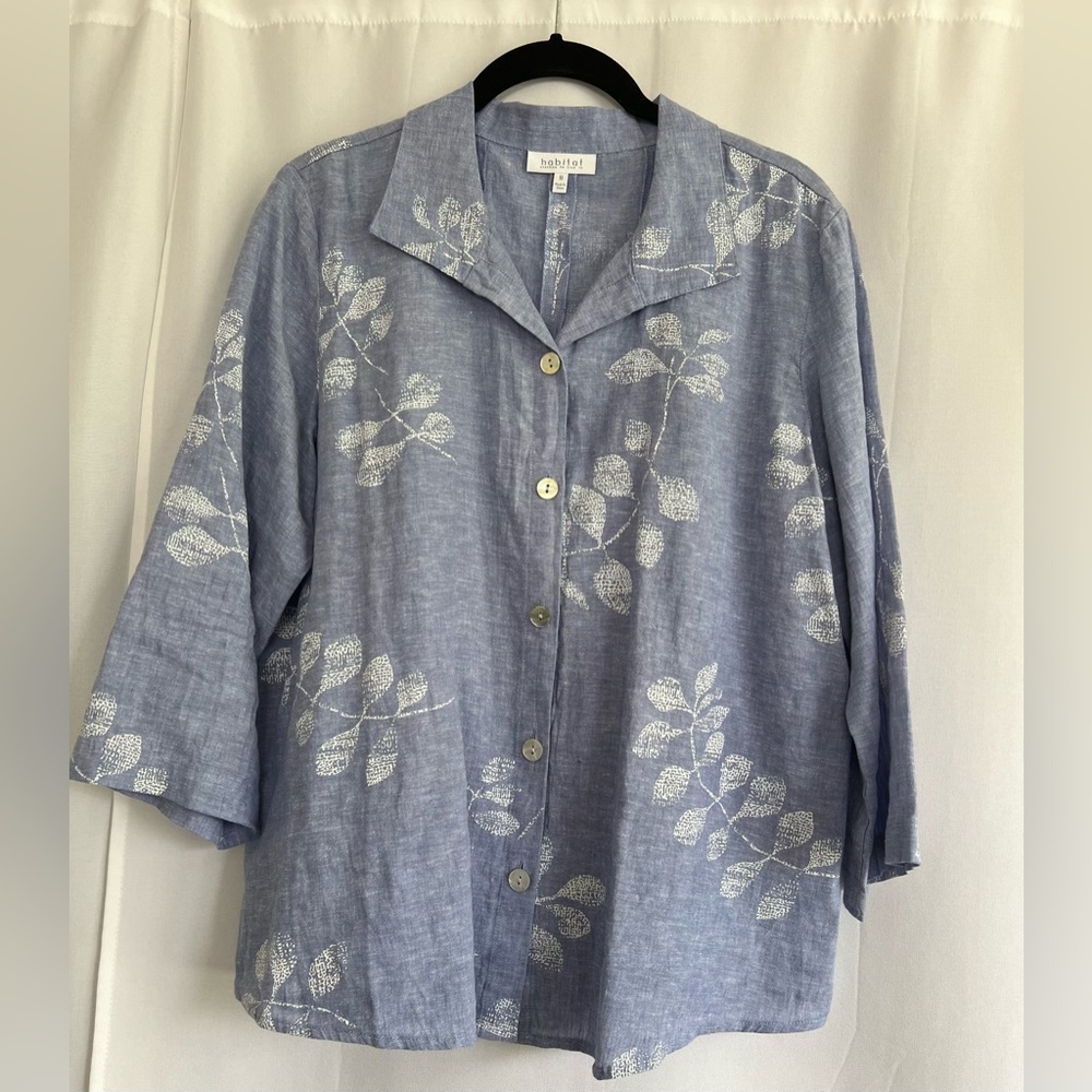 Women’s blouse.  Worn once.  Linen/cotton with nice button detail on back.